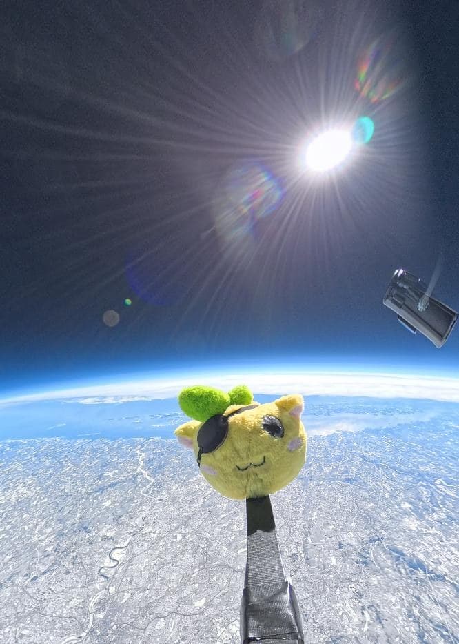 Emy above the Earth, on the edge of space